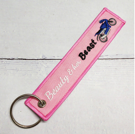 Beauty and Her Beast Pink Key Tag